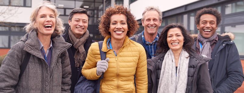 FEC-portrait-of-group-of-smiling-mature-students-stand-3DKJACP